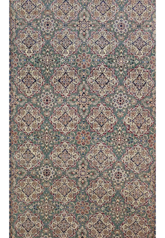Close-up view of intricate floral designs on the 7 x 10 Persian Nain 6 LAA Habibian rug