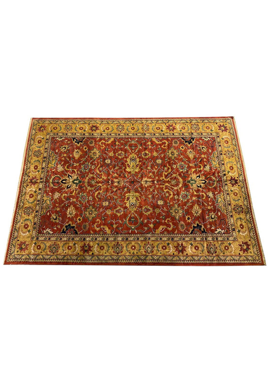 Top view of red and gold Indo Agra rug showing all-over palmette and cloud-band cartouche composition