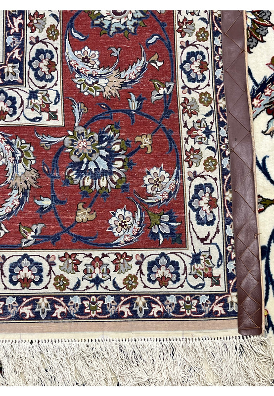 Reverse of the rug showing the fine silk foundation and clean knot structure across the back