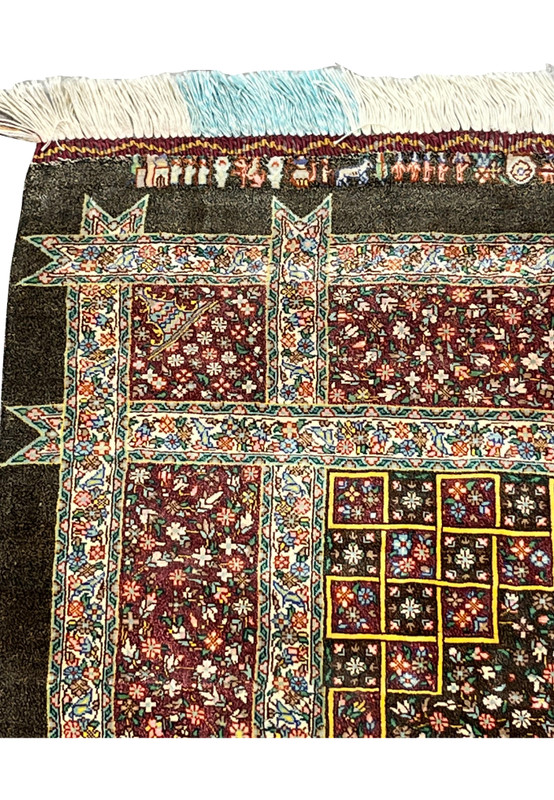 Main border with vase and flower motifs on burgundy ground flanked by ivory guard stripes