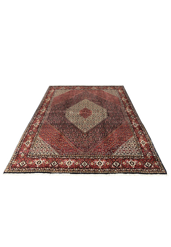 Hand-knotted Bijar 6'9 x 9'6 with stepped ivory medallion, ruby core, and ivory corner pieces on a herati red ground