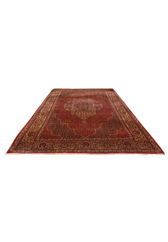 Angled floor view of authentic Persian Bijar rug showing rare ogival medallion and ivory main border