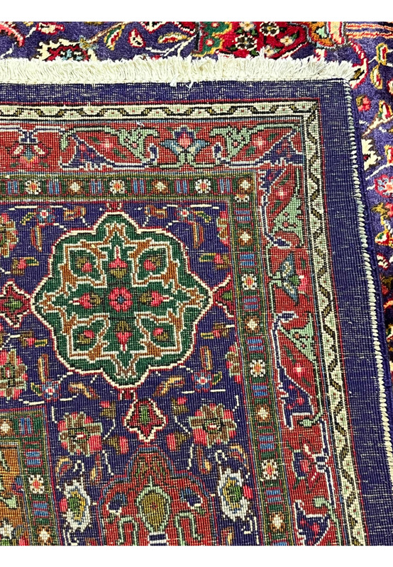 Backside view of authentic Persian Tabriz rug showing crisp design clarity and even hand-knotted weave