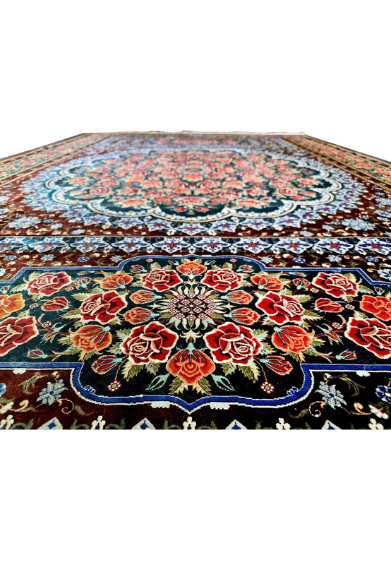 Foreground edge view showing silk pile depth and lower cartouche of fine signed Mohseni Persian Qum 900 KPSI rug