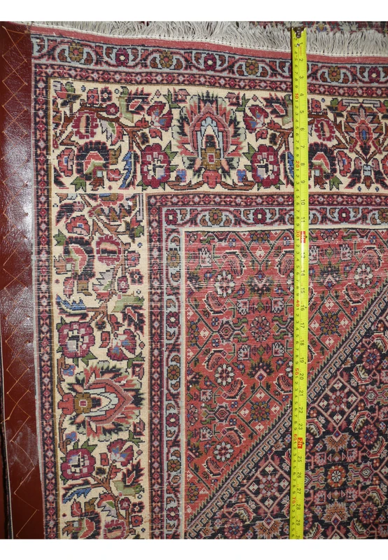 Backside knot density measurement showing approximately 340 KPSI on hand knotted Persian Bijar wool rug