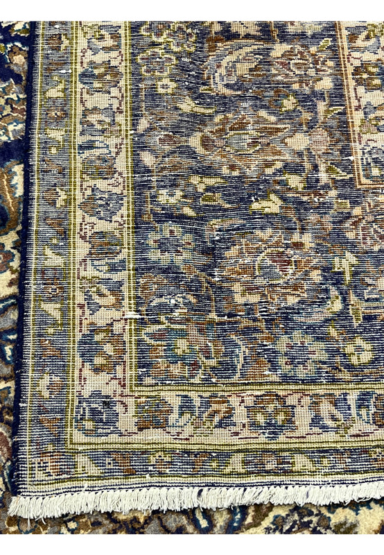 Backside of 10x13 Persian Kashan rug, fine even knotting visible, mirrors front design, hand-knotted authentic Persian
