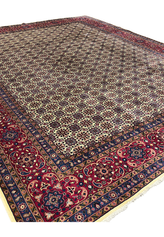 Angled view of fine Persian Mashad rug, ivory allover Mahi field, 400 KPSI Kork wool, for formal living room