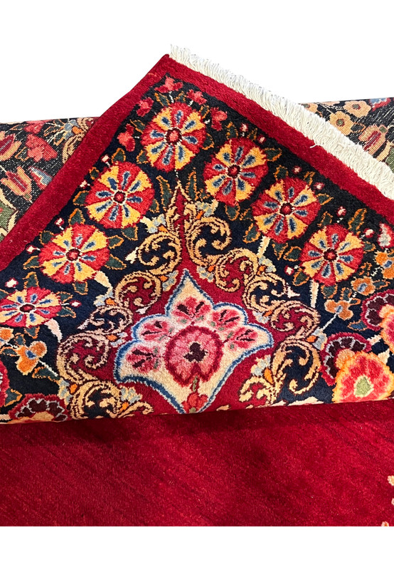 Folded-edge view of signed antique Persian Moud rug, dense wool pile and refined drawing, never used pre-revolution