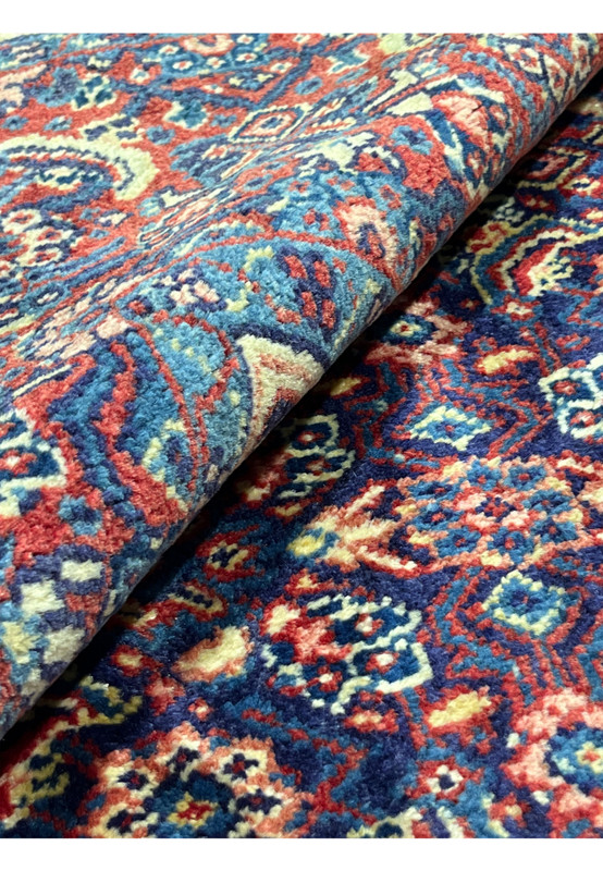 Rolled view Persian Sarough rug showing pile depth and back, 220 to 240 KPSI hand-knotted cotton pile on wool foundation, never used