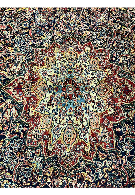 10'6 by 13'5 antique Persian Sarough rug medallion close-up, ivory and crimson starburst with sky blue inner figure