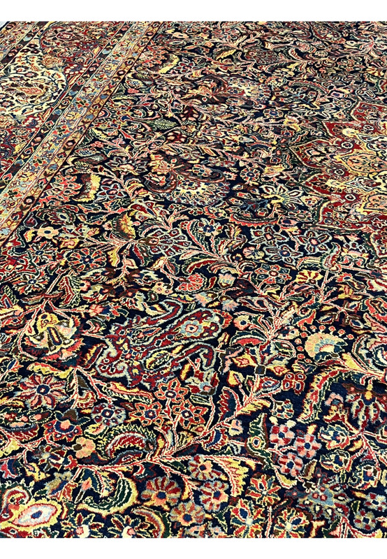 Pattern and motif close-up of pre-revolution Sarough, paired palmettes and vine scroll in canary yellow and rose