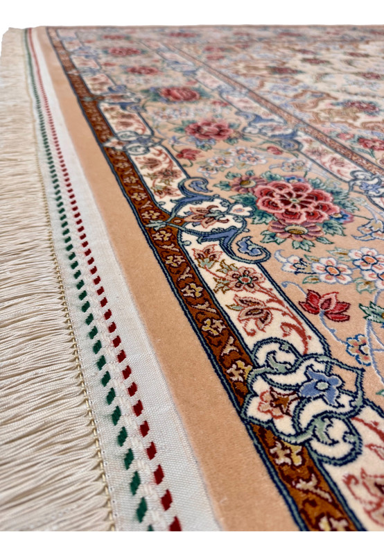 Lower edge of signed Persian Isfahan rug, peach border with rose bouquets and tricolor Iranian flag kilim