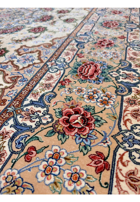 Main border close-up of Habib Persian Isfahan rug, rose bouquet procession with sage leaves and ivory minor guards