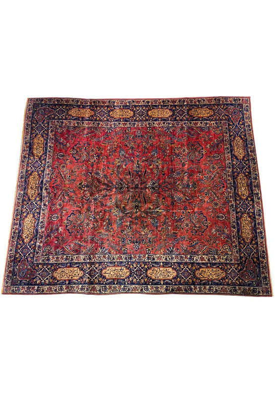 Top view of antique Persian Sarough poetry rug, raspberry-red field with woven verse border