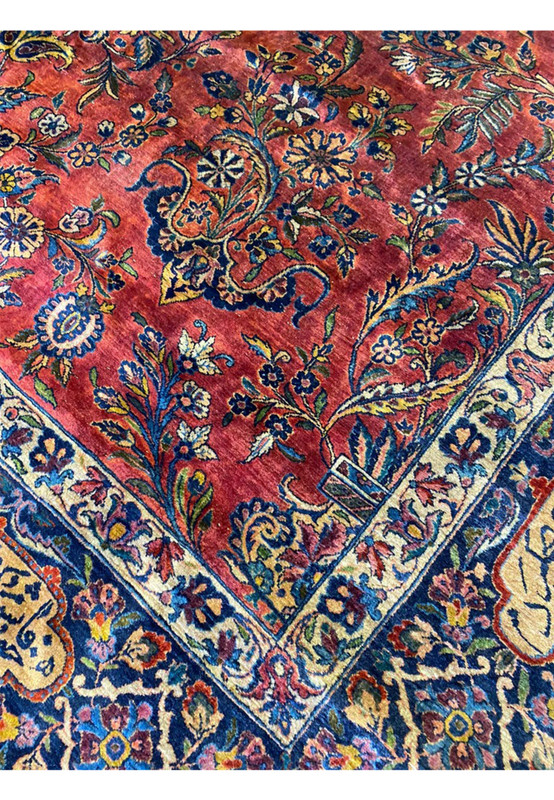 Inner border of antique Persian Sarough rug, flowering vines on red and navy ground