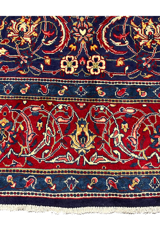 Lower border of red Mahal rug with gold palmette band and sky-blue guard stripes, hand-knotted