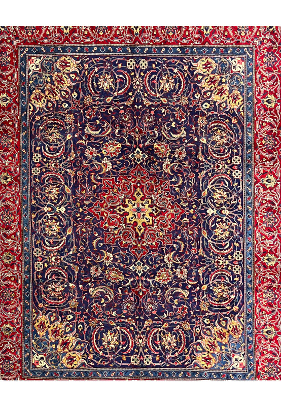 Navy field of Persian Mahal with large curved palmettes, vine scrolls, and ivory rosettes