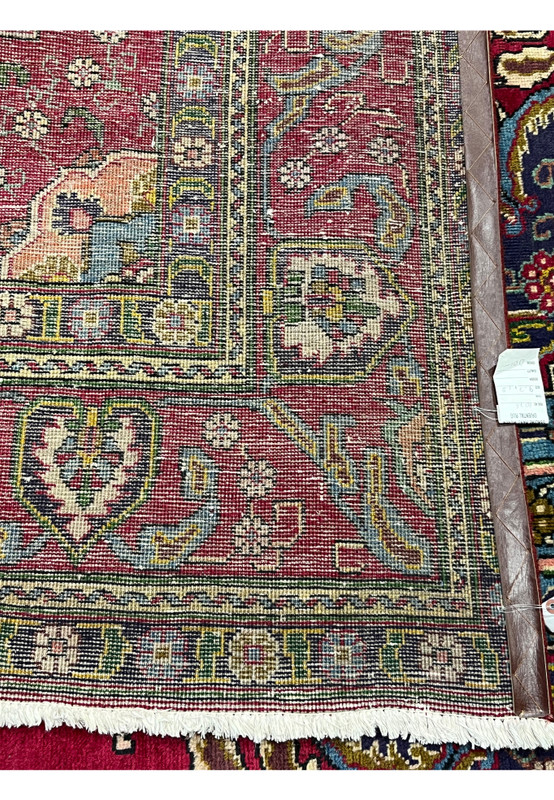 Reverse view of Persian Tabriz rug showing hand-knotted 160 to 180 KPSI wool on cotton foundation, visible patina