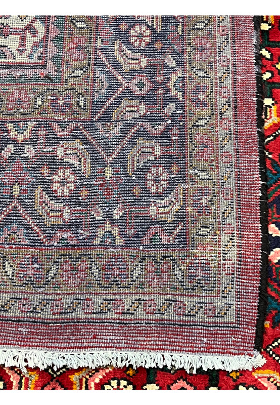 Reverse of the Mahal rug showing the hand-knotted weave and clear pattern definition on cotton foundation