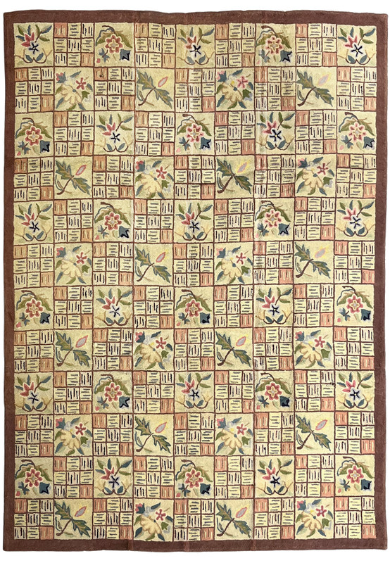 8'11 x 12'2 hand-hooked Oriental rug with patchwork floral tiles and chocolate brown border