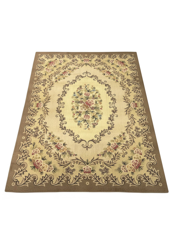 8' x 11'4" hooked rug seen from above, rose and wildflower bouquets scattered across the cream ground