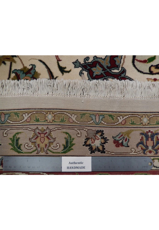 Backside of the hand-knotted Persian Tabriz showing the fine 500 KPSI weave on a silk foundation