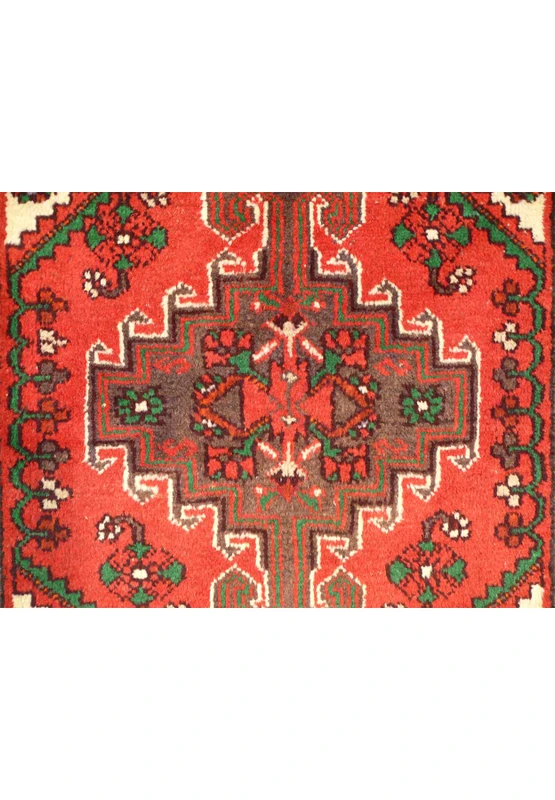 An enchanting Persian Enjlas rug measuring 3'3" x 4'6", adorned with a mesmerizing geometric design that adds elegance and character to any space