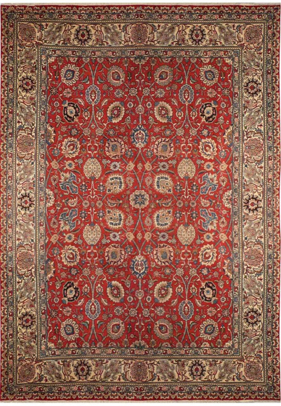 Full view of the vintage 10 x 13'5 Persian Tabriz rug with rusty red allover floral field