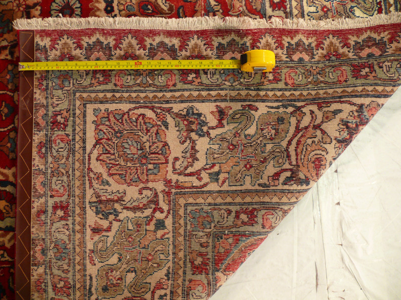 Reverse side of the hand-knotted Persian Tabriz showing even weave and crisp pattern