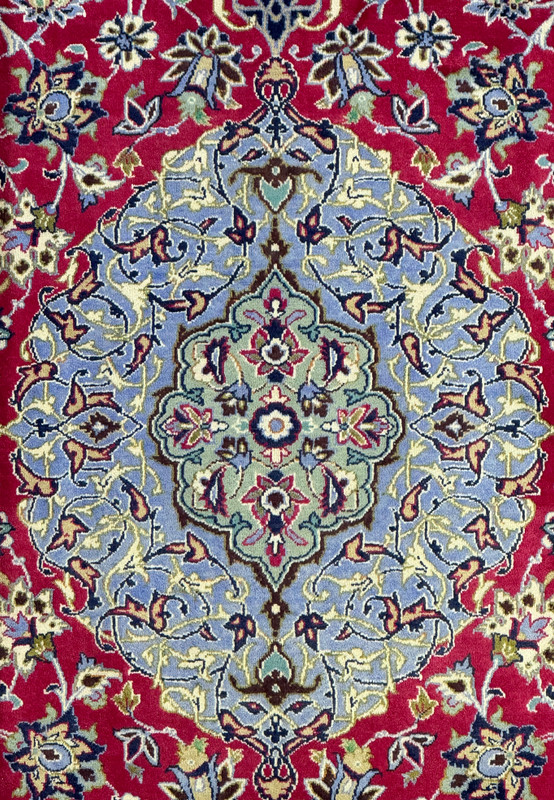 Another pictured zoomed into the beautiful medallion of this 10x13 Isfahan Persian Rug emphasizing the the baby blue color.