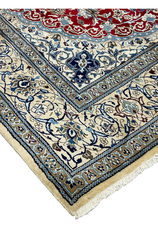 Edge detail of Persian Nain rug showing tight weave, clean side finish, and well preserved wool pile