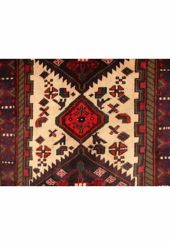 Detailed shot of the border and corner design of the Antique Persian Hamedan rug