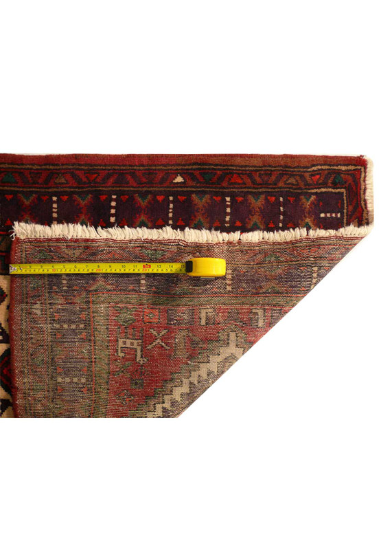 Back view of the 3'3 x 5 Antique Persian Hamedan rug showing the knots and weave