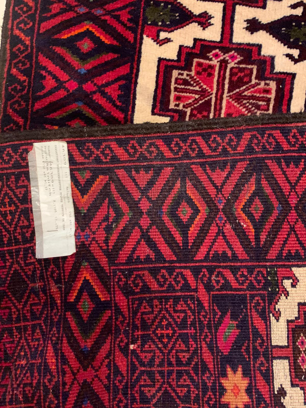 Back view of the 3 x 5 Persian Baluch Prayer rug showing knots and weave