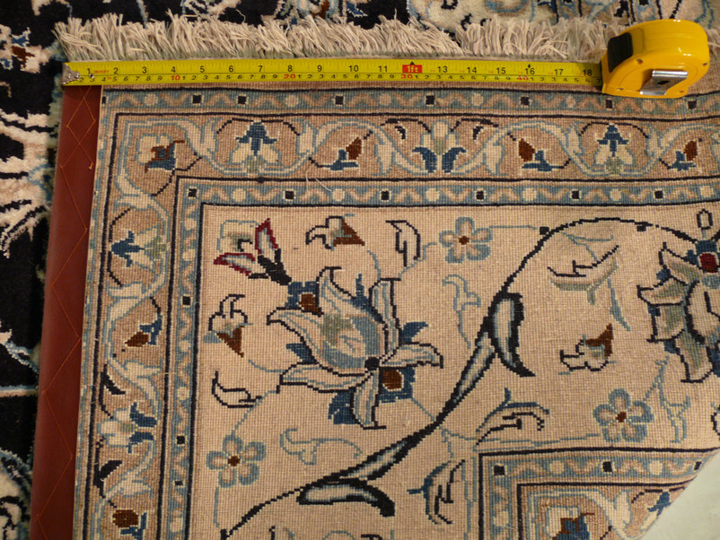 close up backside of 8x11 Nain Persian rug highlighting density of this beautiful nain rug.
