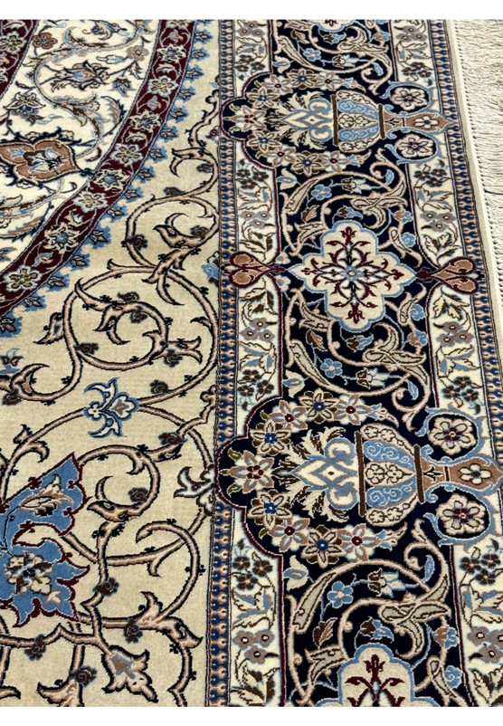 Close-up of the intricate patterns on the 9 x 9 Nain 6LA Persian Rug