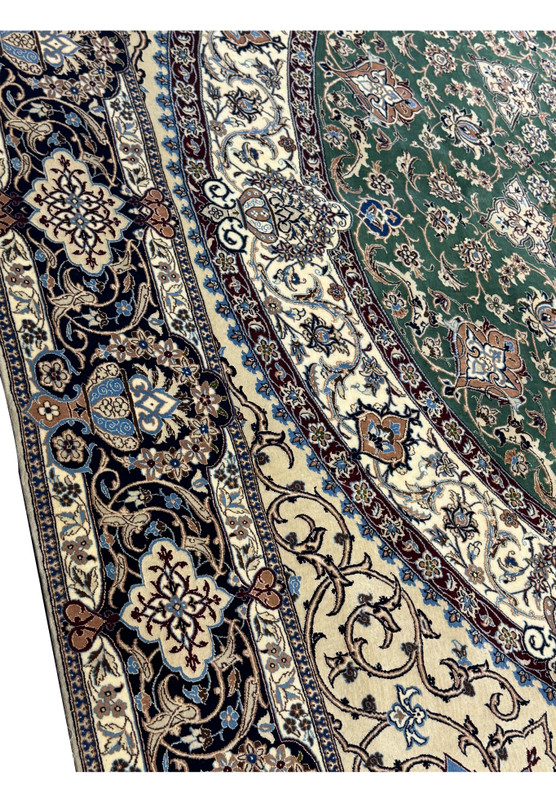 Corner perspective highlighting the exquisite border and floral motifs.