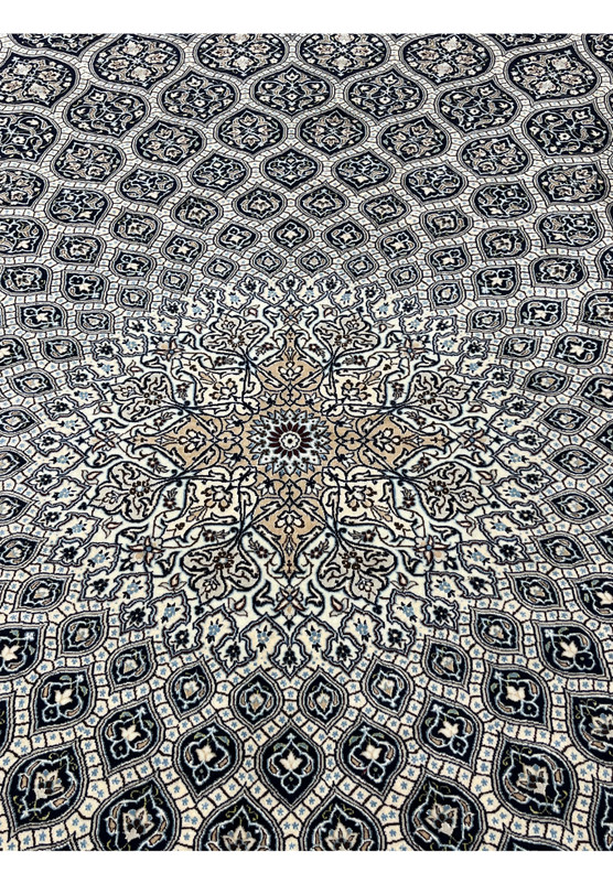 Central dome medallion of Persian Nain Habibian 6 LA rug with silk outlined floral rosettes ivory and camel tones.