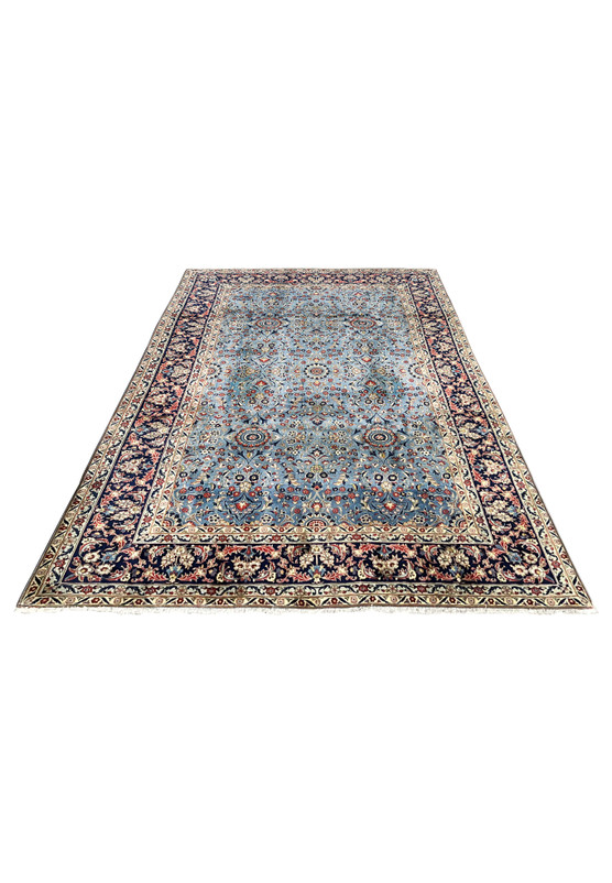 Authentic hand knotted Persian Kashan rug 8x12 blue allover floral full angled view
