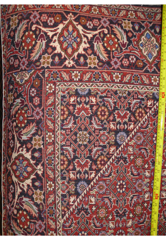 Backside knot density measurement showing 340 to 360 KPSI on hand knotted Persian Bijar wool rug