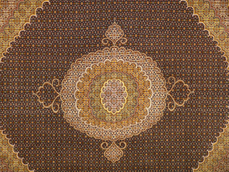 Experience the luxurious texture of our Persian Tabriz Rug with its high-quality wool and silk materials that are soft to the touch