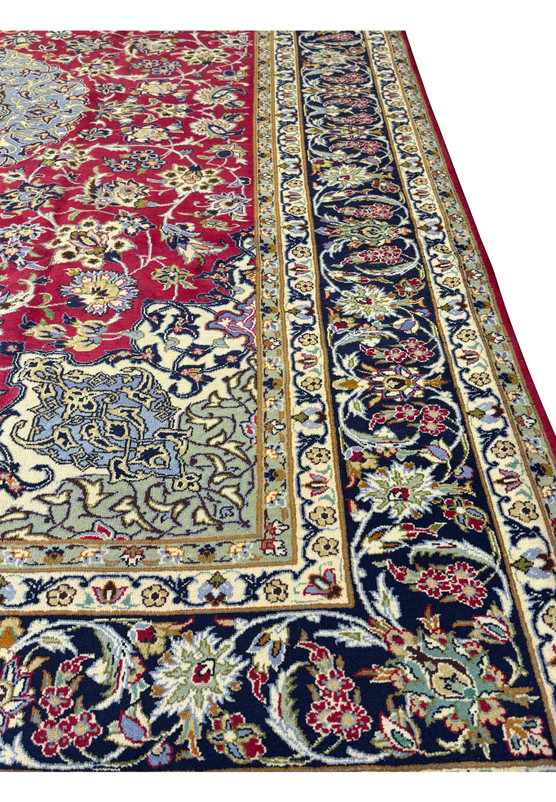 Side view of Persian Isfahan Rug emphasizing the fine craftsmanship and color harmony.