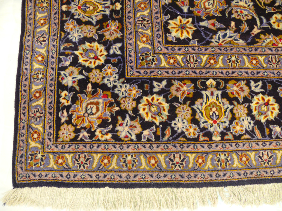Border Beauty - Persian Kashan Rug Border: Marvel at the intricately designed border of this 9'7 x 13'9 Persian Kashan Rug, showcasing fine details and expert artistry that frame the rug's elegance