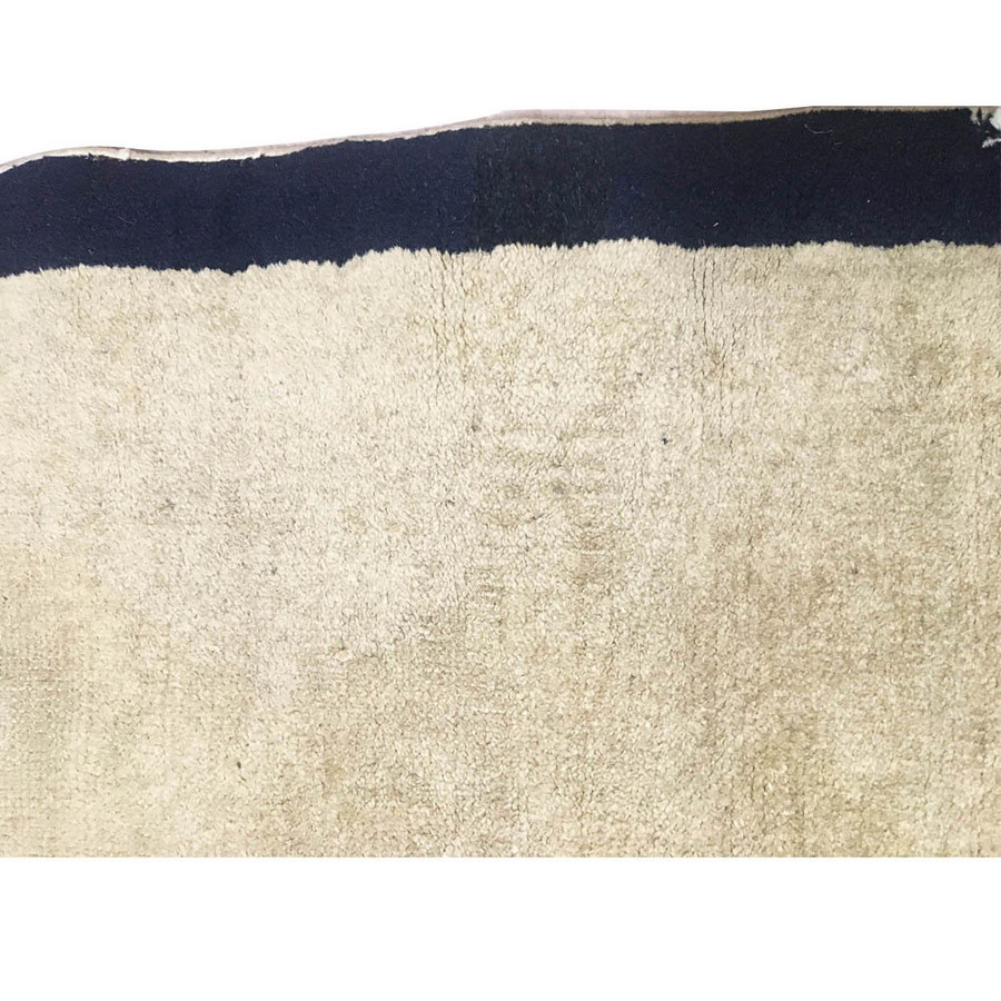 Textural shot highlighting the wear and craftsmanship of the 65-year-old semi-antique rug.