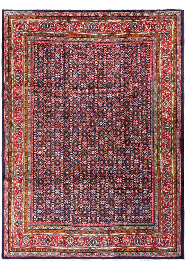 9'8 x 13'2 Persian Mahal Rug with a deep navy blue background and vibrant red, gold, and green floral patterns