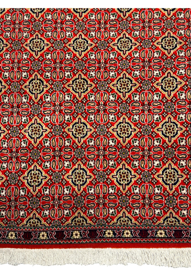 Geometric and floral motifs on 3x4 Persian Qum Kork Rug