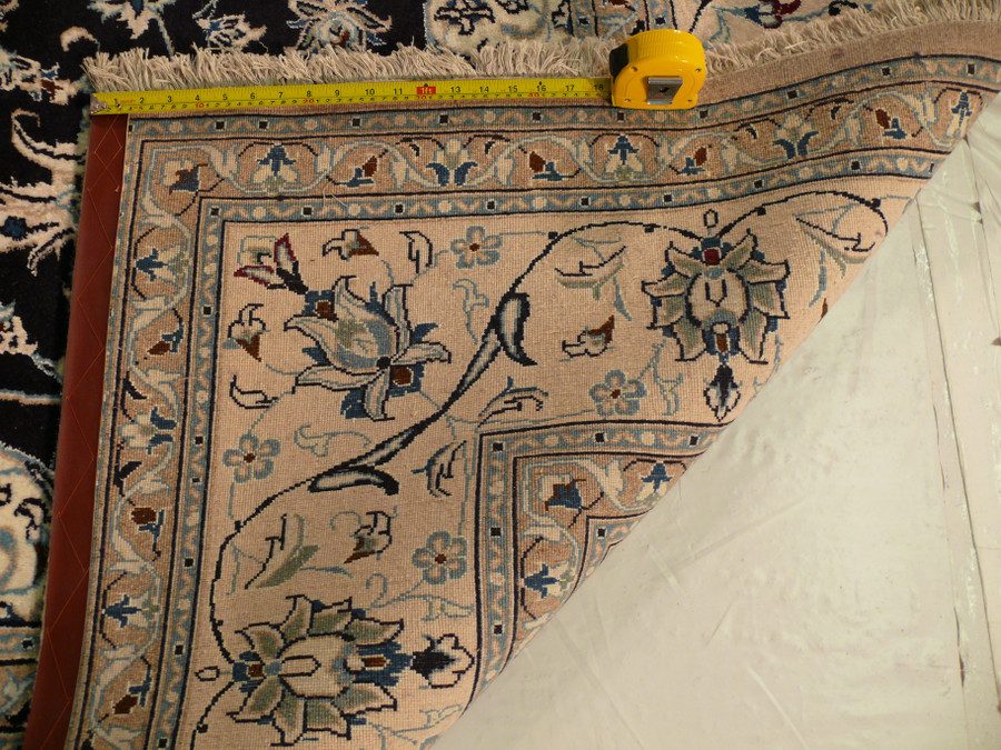 Backside view showing cotton foundation and weave structure on Persian Nain rug