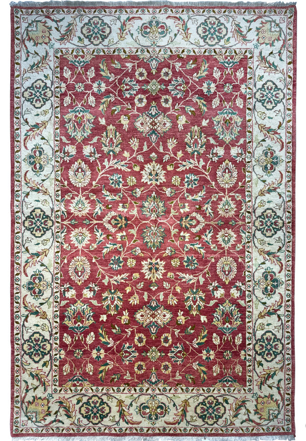 6x9 Ziegler Rug displaying intricate floral and vine patterns with a prominent burgundy field, bordered by cream and sage green accents, showcasing the exquisite detail of handmade oriental rugs