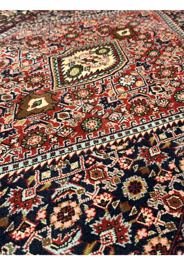 Admire the heritage! This Bijar rug's traditional design, seen in its 3x5 dimensions, harmonizes classic Persian motifs with timeless allure.