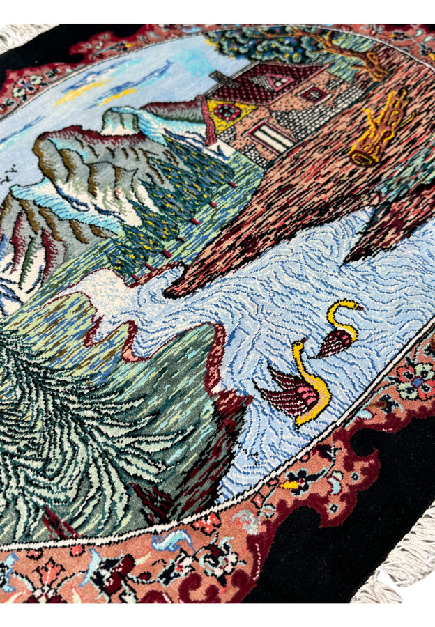 Intricate border design of a Persian Qum silk rug featuring floral motifs in crimson, beige, and indigo on a black background